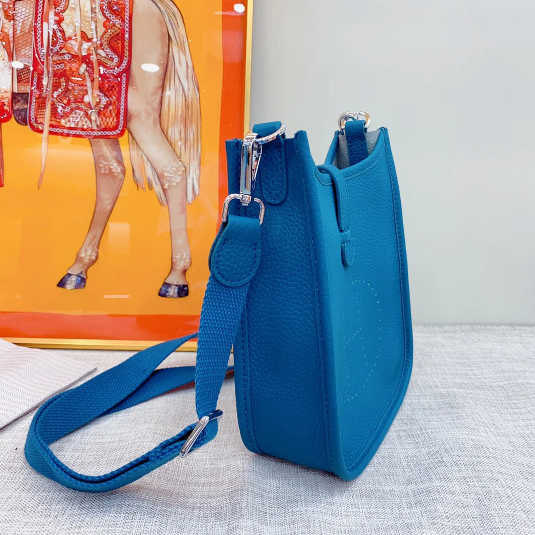 Evelyne TPM Bleu Zanzibar Taurillon Clemence