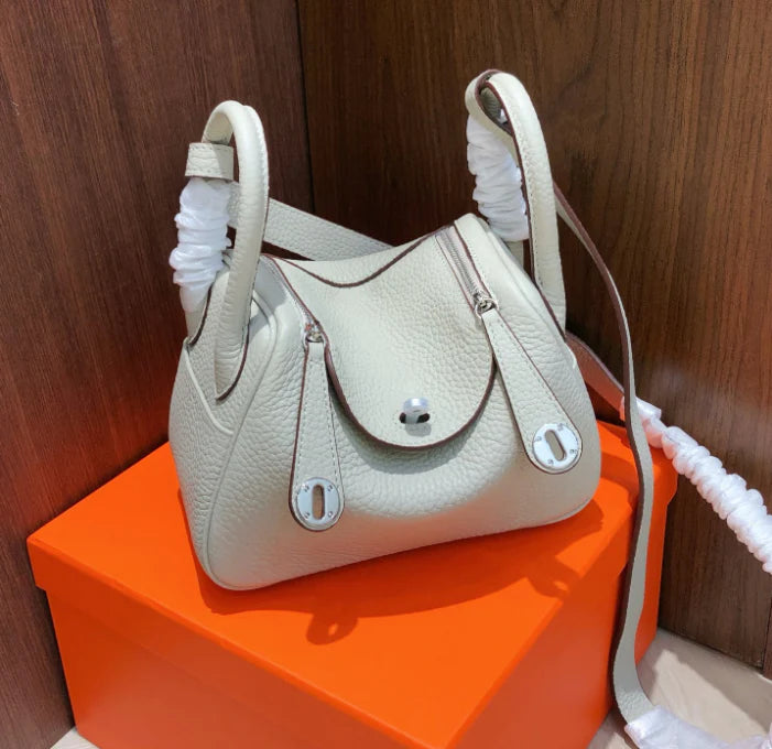 small size Lindy bag, original top-grain TC cowhide leather with silver hardware, pearl grey and cherry blossom pink